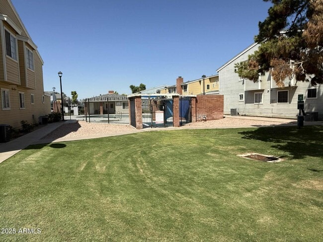 Building Photo - 510 N Alma School Rd