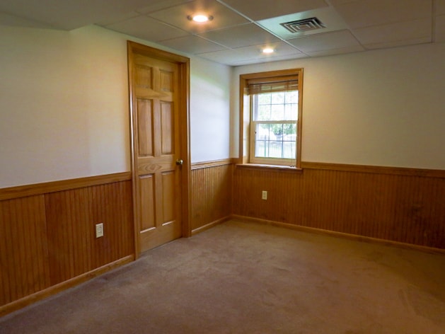 Bedroom with door leading to additional storage - 365 Lynne Dr