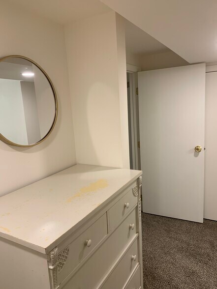 From storage to small hallway - 103 W 30th Ave