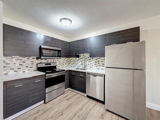 Building Photo - 1800 NW 52nd Ave