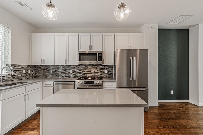 Building Photo - Modern 2BD, 3BA RiNo Townhome with Garage and Rooftop Deck