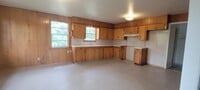 Building Photo - Huge 3 bedroom/1 bath upstairs apartment with Water, Gas Range and Refrigerator!