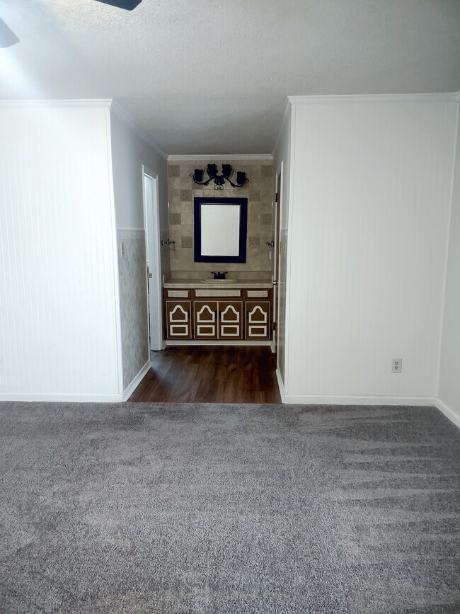 MAster Bedroom ceramic tiled vanity, walk-in closet and Bathroom-Shower. - 120 Arrow Lands Trl