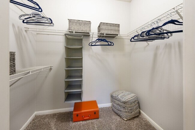 Building Photo - Live Large, Save Larger