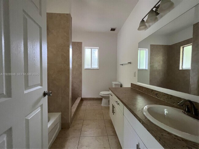 Building Photo - 3334 NE 3rd Dr