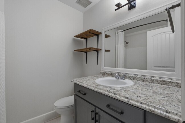 Building Photo - 1303 General Macarthur Dr