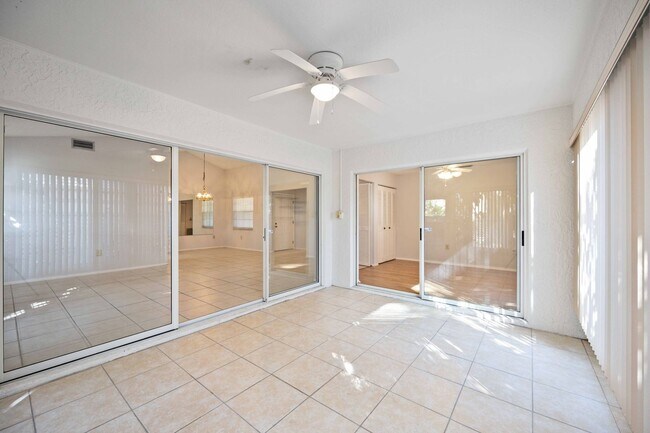 Building Photo - Beautiful Must See!! 3/2 Plus Sunroom & Garage!!  Gated Community!!