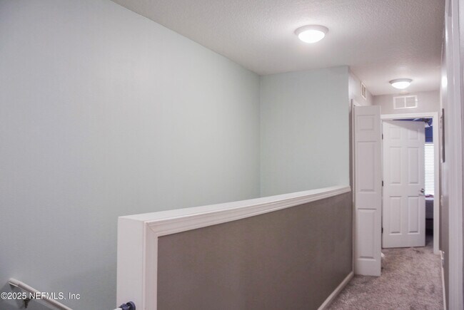 Building Photo - 7450 Scarlet Ibis Ln