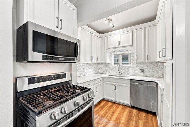 Building Photo - 304 W Delavan Ave