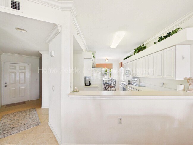 Building Photo - 10391 Butterfly Palm Dr
