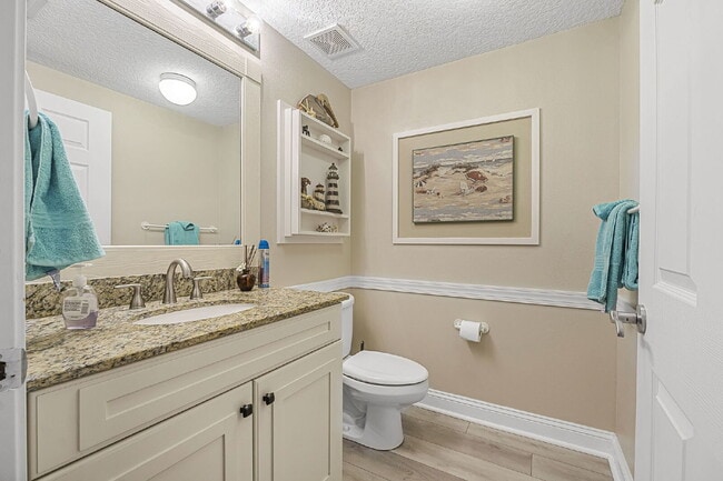 Building Photo - Available for a 7-12 month lease, Unit 208 has a beautiful oceanfront setting.