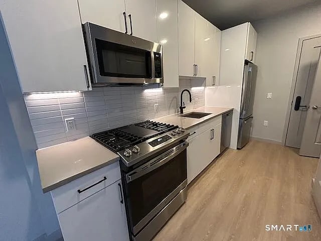 Building Photo - Toll Brothers apartment living communities combine