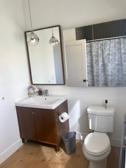 framed mirror and vanity - 1072 Amoroso Pl