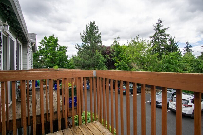 Building Photo - FREE RENT: Contemporary One Bedroom w/New Luxury Vinyl Flooring + Vaulted Ceilings!