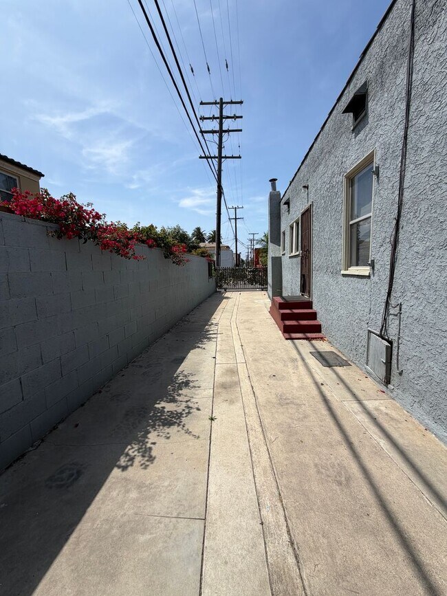 Building Photo - READY TO MOVE IN- MUST SEE - TWO CAR OFF STREET PARKING SPOTS AND UTILITIES PAID