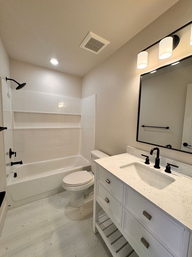 Building Photo - Modern, Spacious 3-Bedroom Townhome in the...