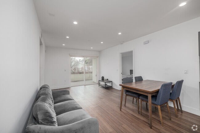 3BR, 2BA - 1,081SF - Living Room - 1450 S Barrington Ave
