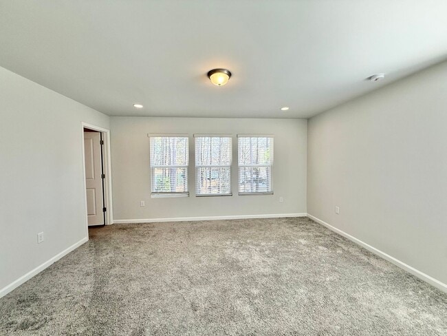 Building Photo - Stunning End Unit 3BD, 2.5BA Wendell Townhome with a 2-Car Garage in a Gorgeous HOA Community wit...
