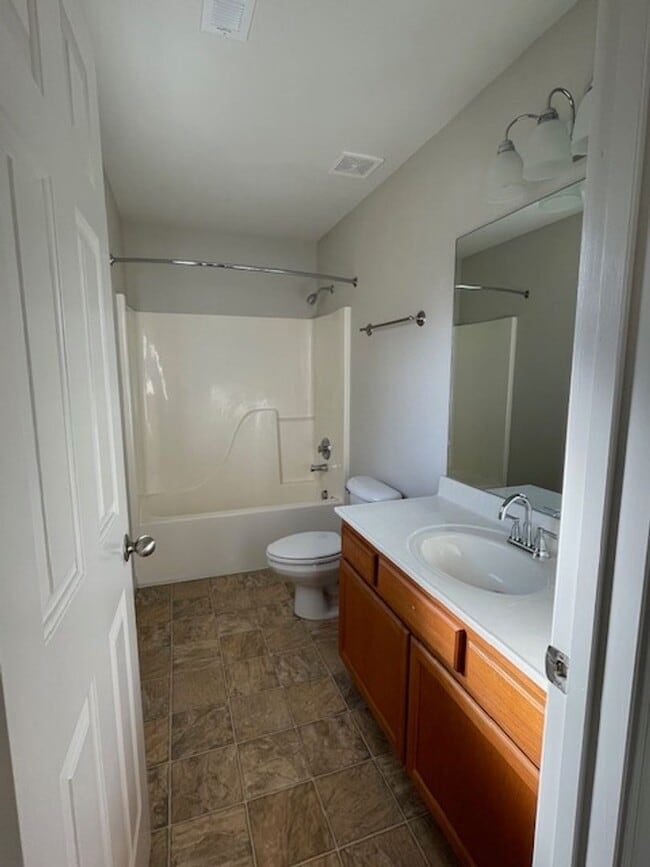 Building Photo - Single Story - 3 bedrooms, 2 baths, spacious living room, kitchen & a 2 car garage, located on a ...