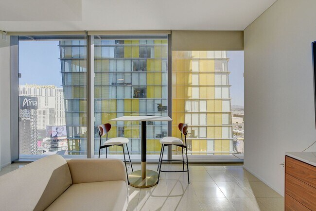 Building Photo - Stunning Strip Views from this Fully Furnished Studio Residence.