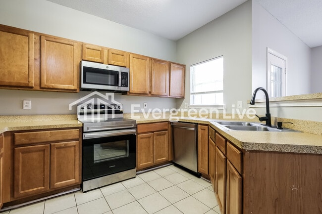 Building Photo - 2318 Coach Way