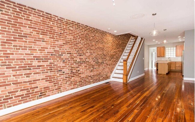 Building Photo - Charming 2bdrm 2.5 bath Patterson Park home with parking and rooftop deck