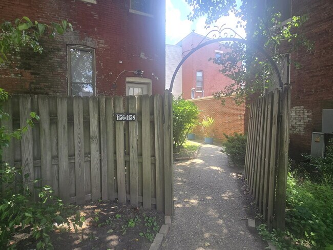 Building Photo - "2-Bed Condo with Gleaming Hardwood Floors...