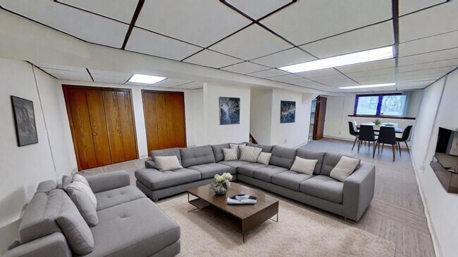 Building Photo - Updated 2BR/1BA duplex with office in partially finished basement, detached garage and across fro...