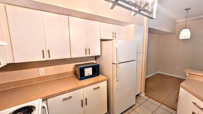 Building Photo - ANNUAL UNFURNISHED GROUND FLOOR CONDO 3 BED 2 BATH