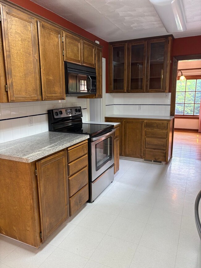 Building Photo - Classic Brick Charmer - 4 Bedroom