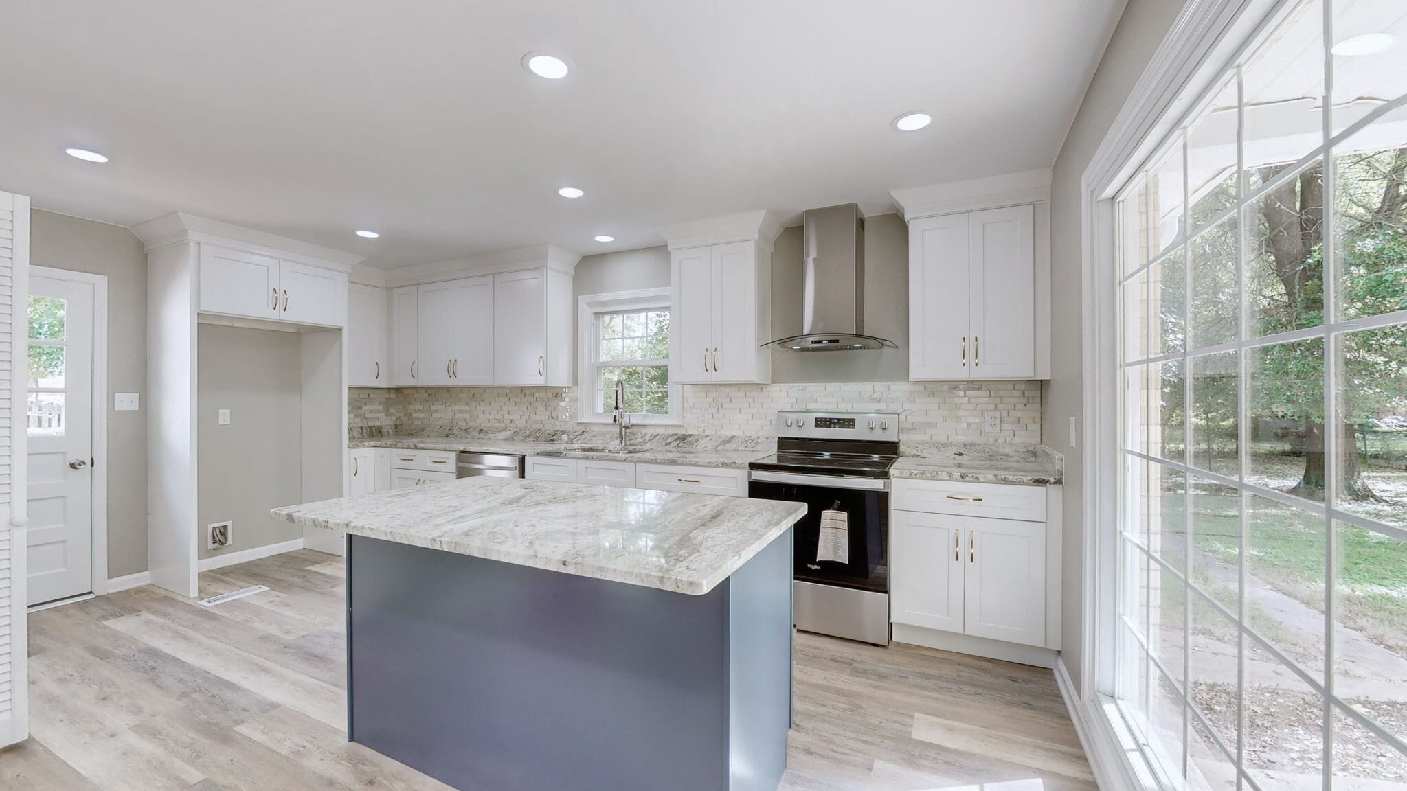 Large, bright kitchen with PLENTY of cooking space. - 1306 Wilford St