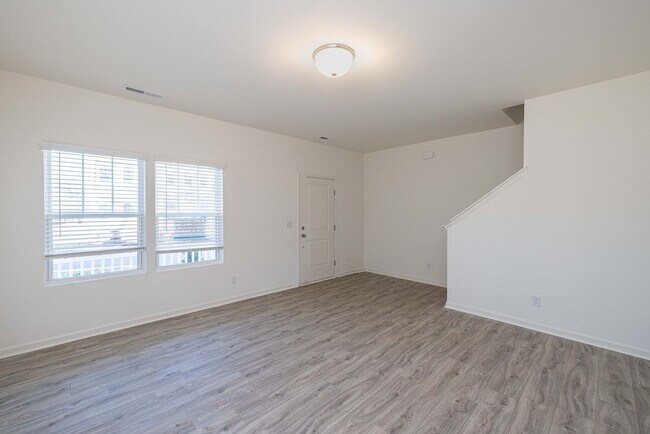 Building Photo - READY IN AUGUST 3 br 2.5 Townhome Near His...