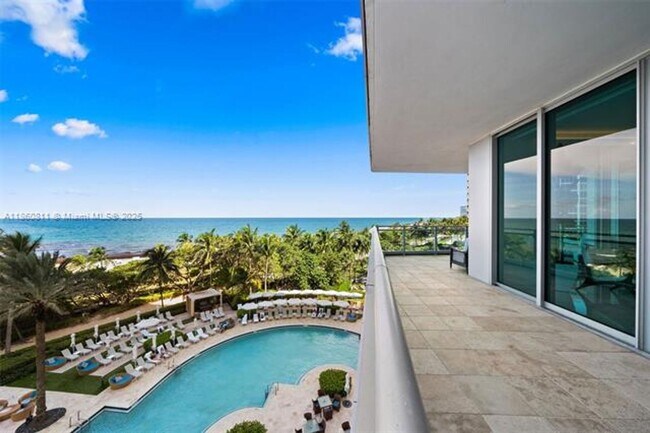 Building Photo - 10295 Collins Ave