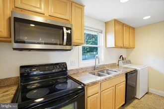 Building Photo - 6924 Kenfig Dr