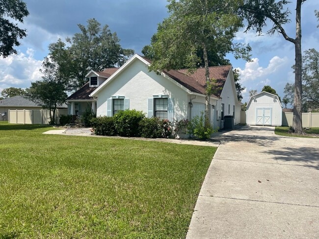 Primary Photo - Spacious 4-Bedroom Pool Home – 2 Primary S...