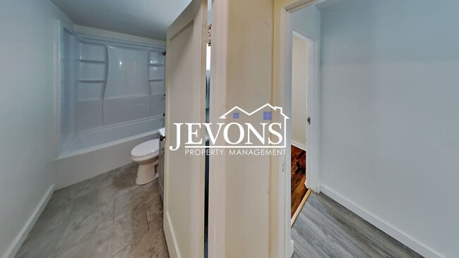 Building Photo - Step into your new residence, a charming s...