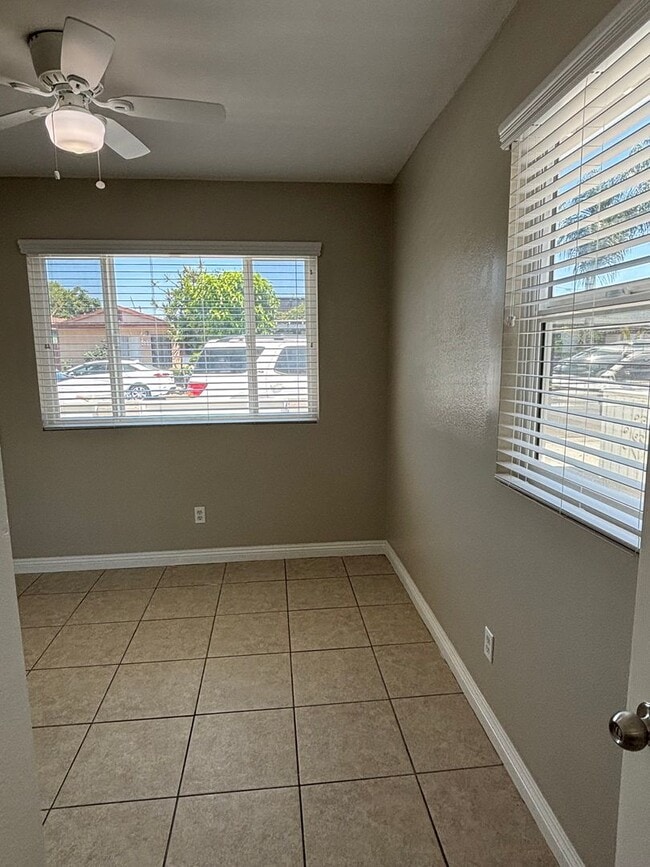 Building Photo - Cozy, Updated, and Pet-Friendly — Your New...