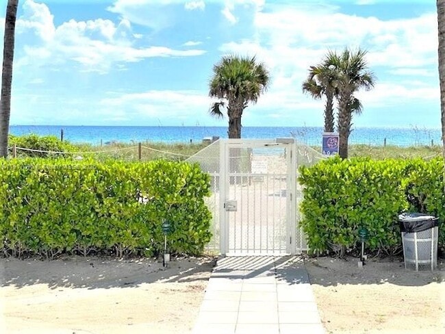 Building Photo - 5005 Collins Ave