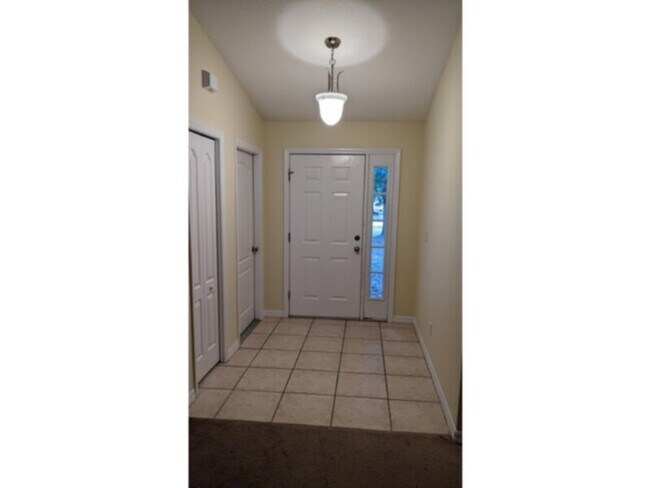 Building Photo - Cute duplex in Palm Coast      www.werents...