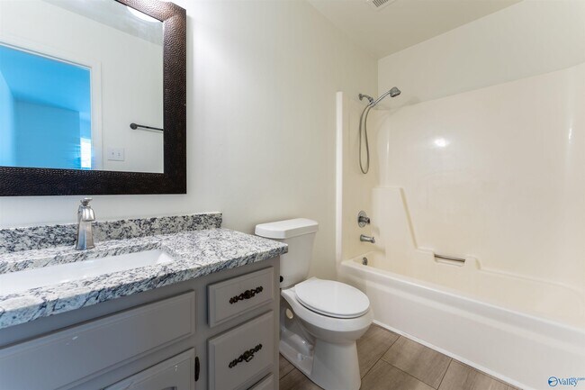 Building Photo - 7513 SW Clubfield Dr