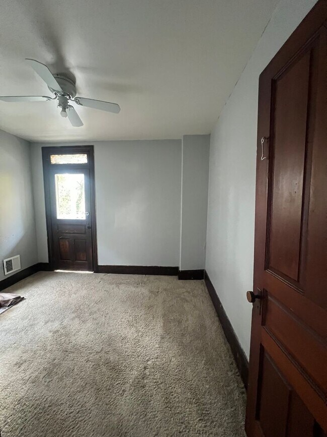 Building Photo - Renovated and Charming Townhome Available Now