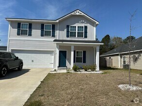 Building Photo - Tranquil South Retreat: Spacious 5-Bed Hom...