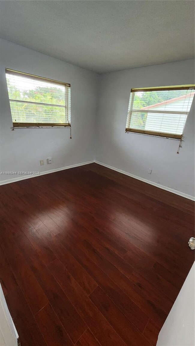 Building Photo - 3090 Coral Springs Dr