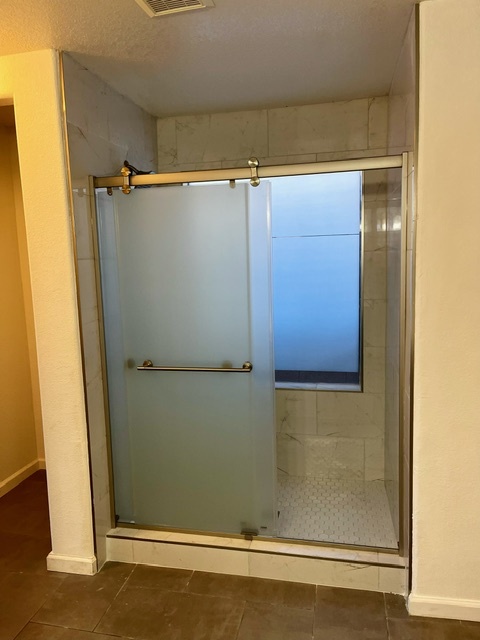 Walk in shower primary bedroom - 15300 N 85th Dr