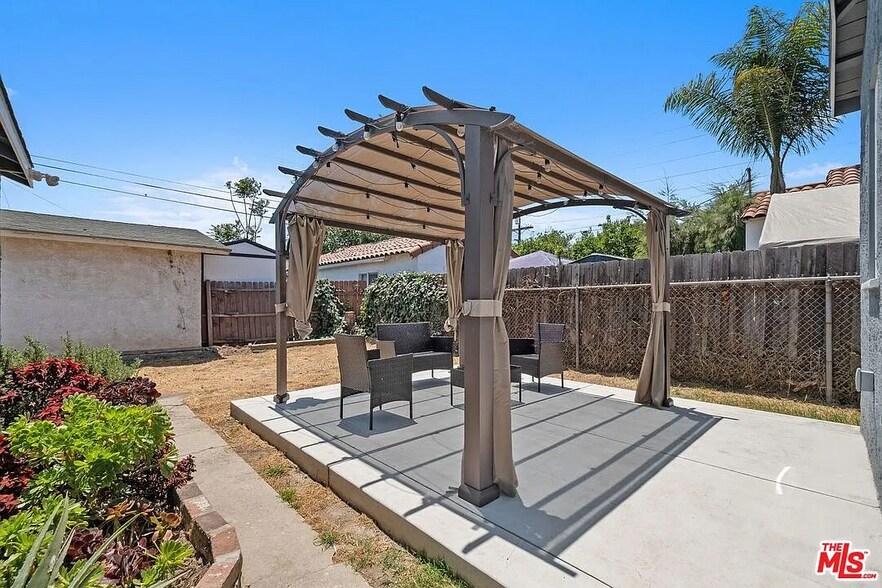 Backyard w/Patio - 672 E 119th St