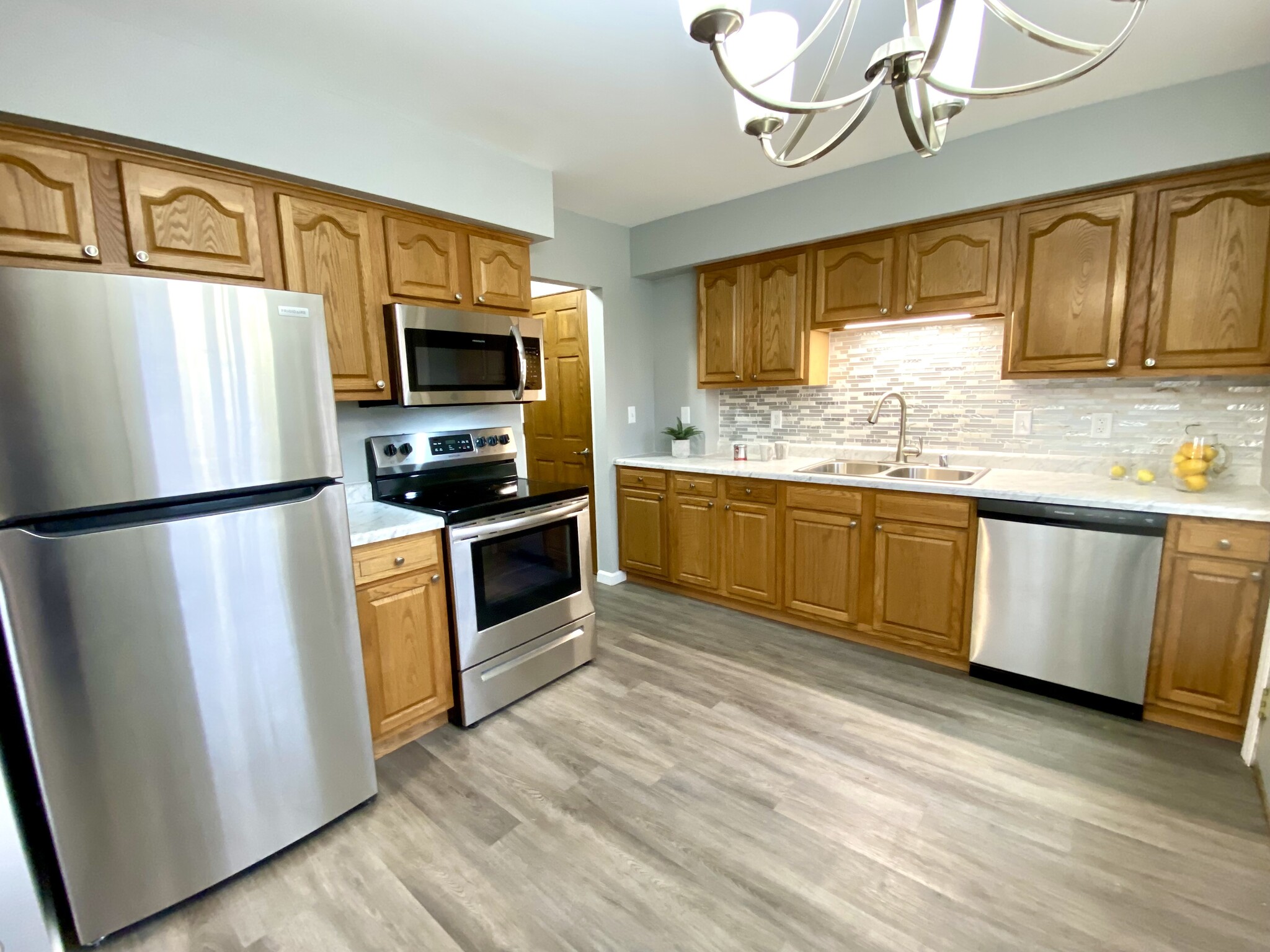 Updated Kitchen with New Counters, NEW Stainless Steel Appliances & Ceramic Tiled Backsplash! - N89W15976 Main St