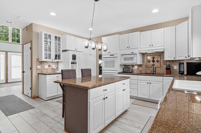 Building Photo - Luxury 4-Bed Retreat with In-Ground Pool & 3-Car Garage