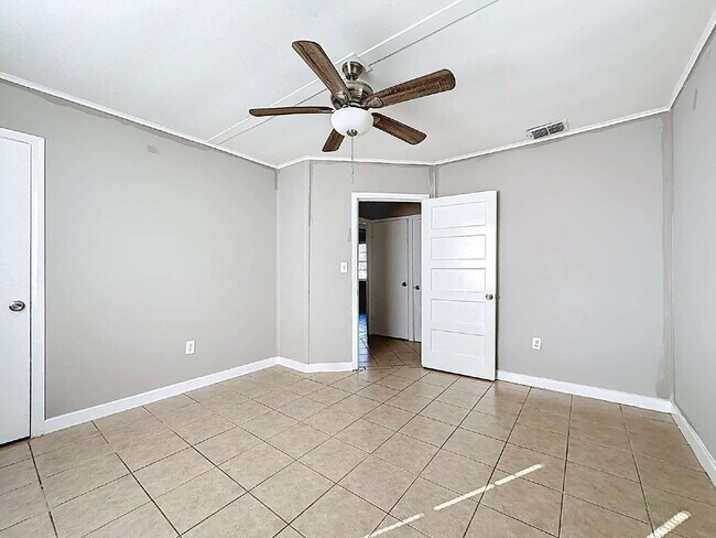 Building Photo - 6377 Lamar Dr