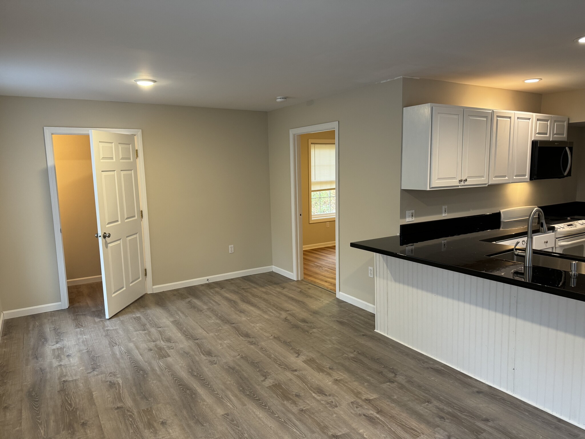 Living Looking at 1/2 Bath and Bedroom - 224 Jeff Heights Rd