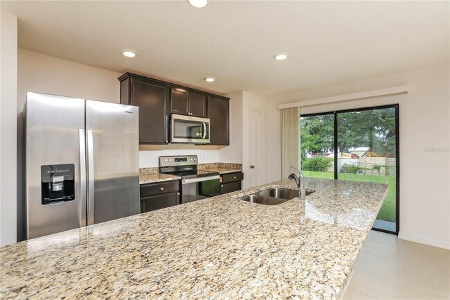 Building Photo - 35669 Rose Moss Ave